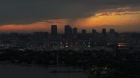 5.7K stock footage aerial video of slowly approaching the Downtown Tampa skyline at twilight, Florida Aerial Stock Footage | DX0003_232_010