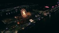 HD stock footage aerial video approach the Ferris Wheel on historic Navy Pier at night, Downtown Chicago, Illinois Aerial Stock Footage | ED0001_000024