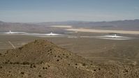 4K stock footage aerial video of the three towers and arrays of the Ivanpah Solar Electric Generating System, California Aerial Stock Footage | FG0001_000166