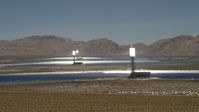 4K stock footage aerial video flyby the towers and mirrors of the Ivanpah Solar Electric Generating System in California Aerial Stock Footage | FG0001_000182