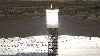 4K stock footage aerial video orbit the top of a power tower at the Ivanpah Solar Electric Generating System in California Aerial Stock Footage | FG0001_000185