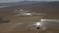 4K stock footage aerial video of a view of the three solar power structures at the Ivanpah Solar Electric Generating System in California Aerial Stock Footage | FG0001_000210