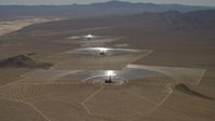 4K stock footage aerial video tilt to reveal the solar power structures at the Ivanpah Solar Electric Generating System in California Aerial Stock Footage | FG0001_000212