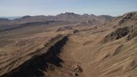 4K stock footage aerial video of a view across rough desert mountains in the Nevada Desert Aerial Stock Footage | FG0001_000254