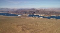 4K stock footage aerial video of approaching the Lower Narrows arm of Lake Mead in the Nevada Desert Aerial Stock Footage | FG0001_000269