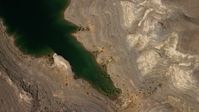 4K stock footage aerial video of an overhead view of flat plain the Nevada Desert, and reveal the shore of Lake Mead Aerial Stock Footage | FG0001_000273