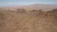 4K stock footage aerial video flyby rugged, barren mountains in the Nevada Desert Aerial Stock Footage | FG0001_000282