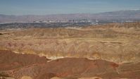 4K stock footage aerial video tilt from barren desert mountains to reveal Las Vegas, Nevada Aerial Stock Footage | FG0001_000301