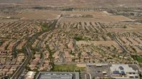 4K stock footage aerial video fly over and pan across neighborhoods with tract homes and apartment buildings in Las Vegas, Nevada Aerial Stock Footage | FG0001_000358
