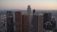 HD stock footage aerial video tilt up and flyby Bank of America Center to approach Paul Hastings Tower at twilight, Downtown Los Angeles, California Aerial Stock Footage | HDA06_75