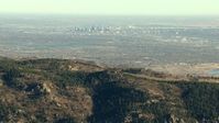 HD stock footage aerial video zoom wider from Downtown Denver and Marston Lake, reveal the Rocky Mountains, Colorado Aerial Stock Footage | HDA13_482_03