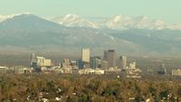 HD stock footage aerial video of massive Rocky Mountains behind Downtown Denver, Colorado Aerial Stock Footage | HDA13_488_03
