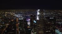 5K stock footage aerial video of panning across skyscrapers in night inDowntown Los Angeles, California Aerial Stock Footage | LD01_0079