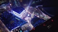 5K stock footage aerial video ice skating and fair at Nokia Theater at night Downtown Los Angeles, California Aerial Stock Footage | LD01_0081
