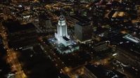 5K stock footage aerial video flyby skyscrapers at night in Downtown Los Angeles, California toward city hall Aerial Stock Footage | LD01_0086