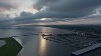 4K stock footage aerial video of Lake Pontchartrain and a marina at sunrise, New Orleans, Louisiana Aerial Stock Footage | PVED01_001