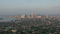 4K stock footage aerial video approach the French Quarter and Downtown New Orleans, Louisiana sunrise Aerial Stock Footage | PVED01_004