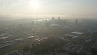 4K stock footage aerial video approach Superdome and Downtown New Orleans from Mid-City at sunrise, Louisiana Aerial Stock Footage | PVED01_026