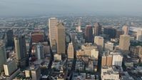 4K stock footage aerial video orbit tall skyscrapers in Downtown New Orleans, Louisiana at sunrise Aerial Stock Footage | PVED01_040