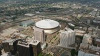 4K stock footage aerial video orbit the Superdome and New Orleans Arena in Downtown New Orleans, Louisiana Aerial Stock Footage | PVED01_123