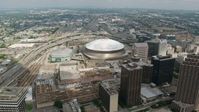 4K stock footage aerial video orbiting the Louisiana Superdome and the New Orleans Arena in Downtown New Orleans, Louisiana Aerial Stock Footage | PVED01_139