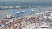4K stock footage aerial video orbit cranes and rows of containers at the Port of New Orleans, Louisiana Aerial Stock Footage | PVED01_147