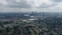 4K stock footage aerial video tilt from Garden District homes to reveal Downtown New Orleans skyline, Louisiana Aerial Stock Footage | PVED01_156