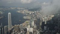 5K stock footage aerial video approach skyscrapers, convention center and harbor on Hong Kong Island, China Aerial Stock Footage | SS01_0042