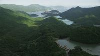 5K stock footage aerial video of green forest around reservoirs on Hong Kong Island, China Aerial Stock Footage | SS01_0061