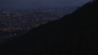 5K stock footage aerial video tilt to reveal the Port of Hong Kong and the Stonecutters Bridge at night, China Aerial Stock Footage | SS01_0111