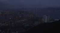 5K stock footage aerial video approach the Port of Hong Kong and the Stonecutters Bridge at night, China Aerial Stock Footage | SS01_0112