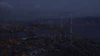 5K stock footage aerial video of flying over the Port of Hong Kong to approach the Stonecutters Bridge at night, China Aerial Stock Footage | SS01_0114