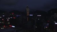 5K stock footage aerial video approach Central Plaza and high-rises on Hong Kong Island at night, China Aerial Stock Footage | SS01_0134