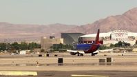 1080 stock footage aerial video of tracking a Southwest passenger jet at McCarran International Airport, Las Vegas, Nevada Aerial Stock Footage | TS02_47