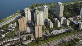 A group of lakefront apartment buildings in Hyde Park, Chicago, Illinois Aerial Stock Photos | AX0001_012.0000407F