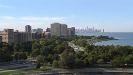Hyde Park apartment buildings, and the Downtown Chicago skyline, Illinois Aerial Stock Photos | AX0002_003.0000257F