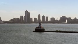 Chicago Harbor Lighthouse, and the Downtown Chicago skyline in the distance, Illinois Aerial Stock Photos | AX0002_048.0000171F