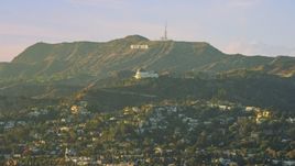 The Hollywood Sign behind Griffith Observatory in Los Angeles, California Aerial Stock Photos | AX0162_045.0000068