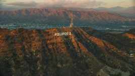 The famous Hollywood Sign at twilight in Los Angeles, California Aerial Stock Photos | AX0162_102.0000000