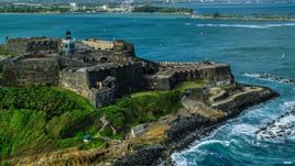 Historic fort along the coast with clear blue water, Old San Juan Puerto Rico Aerial Stock Photos | AX101_012.0000125F