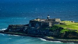 Castillo San Felipe del Morro by blue Caribbean waters, Old San Juan, Puerto Rico Aerial Stock Photos | AX101_019.0000203F