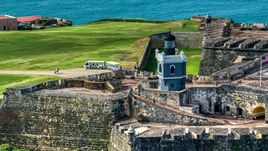 Historic fort and lighthouse in Old San Juan, Puerto Rico Aerial Stock Photos | AX101_025.0000152F