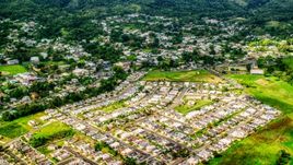 Neighborhood in a small town, Morovis, Puerto Rico  Aerial Stock Photos | AX101_044.0000172F