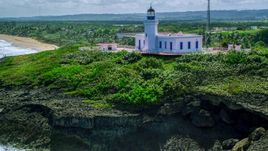 The hilltop Arecibo Lighthouse in Puerto Rico  Aerial Stock Photos | AX101_149.0000000F