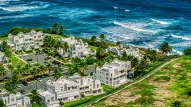Condominiums on the Caribbean island coast in Dorado, Puerto Rico  Aerial Stock Photos | AX101_219.0000256F
