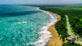 Beach and highway beside crystal blue waters, Dorado, Puerto Rico Aerial Stock Photos | AX101_221.0000226F