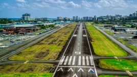 The runway of Isla Grande Airport, Puerto Rico Aerial Stock Photos | AX101_238.0000000F