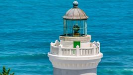 The top of Cape San Juan Light with views of clear blue waters, Puerto Rico Aerial Stock Photos | AX102_070.0000071F