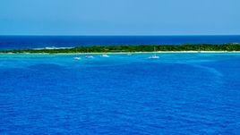 Catamarans near an island in tropical blue waters, Rada Fajardo, Puerto Rico Aerial Stock Photos | AX102_073.0000000F