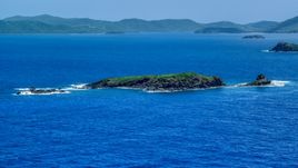 Small Caribbean island in sapphire blue waters near Culebra, Puerto Rico  Aerial Stock Photos | AX102_102.0000000F